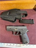Sig Sauer P320  9mm two mag and holster