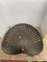 Antique cast iron implement seat
