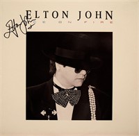 Elton John signed Ice On Fire album