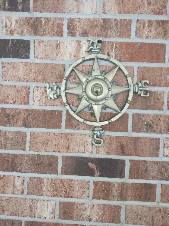 Brass compass star wall decor