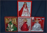 4 Barbie dolls in original boxes: 2010, '11, '12,