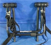 Rear mounted snap back trio bicycle carrier it's