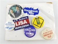 Assorted political campaign buttons, some from Ala