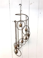 Brass and iron art chime.  Rusty patina and bells