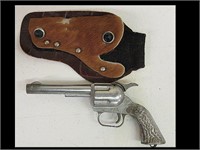 VINTAGE WORKING PAL CAP GUN W/ HAIR ON HOLSTER