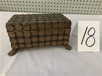 CHEST MADE OF PENNIES