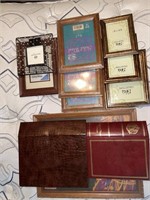 Various picture frames and 2 albums