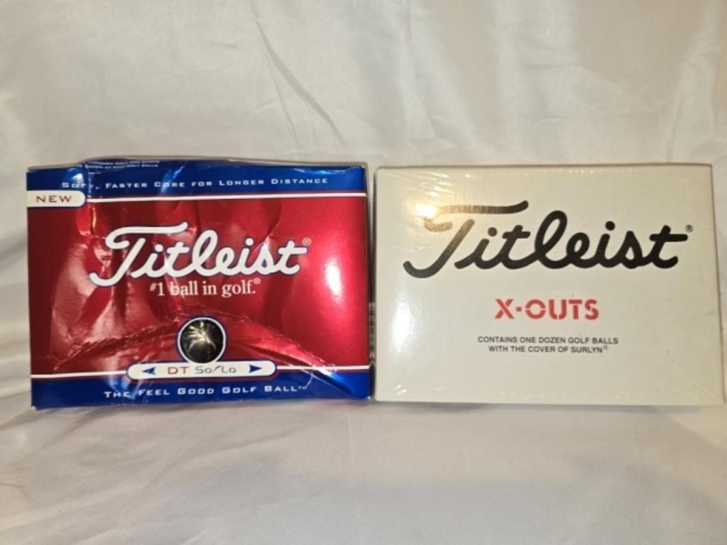 Lot of 2 boxes of golf balls
