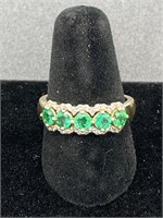 14k gold ring w/ green stones and diamonds