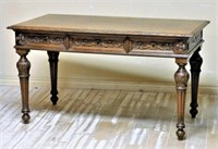 Neo Renaissance Carved Oak Writing Table.