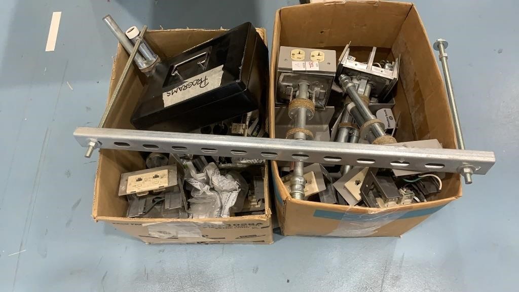 2 boxes of electrical plugs, wires, and other