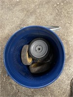 Lawn mower wheels in bin