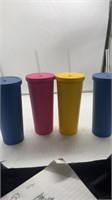 4 colored tumblers with straws