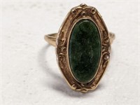 MARKED 10K RING WITH GREEN STONE