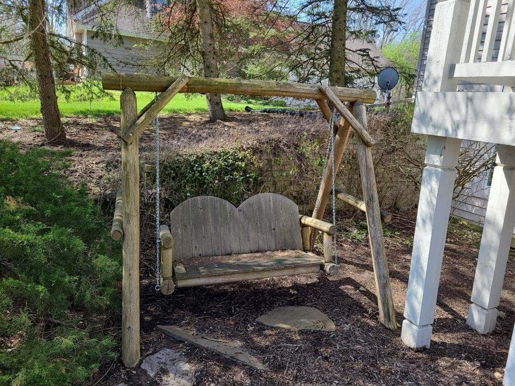 Free-standing Wooden swing set. Backyard