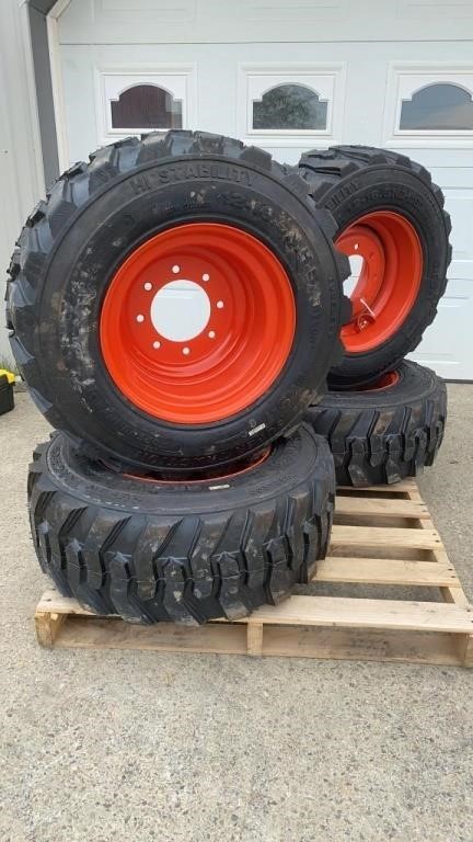 Set of 4 New 12-16.5N.H.S. Skid Steer Tires & Rims