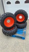 Set of New 10-16.5N.H.S. Skid Steer Tires and Rims