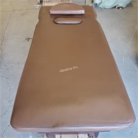 Brown leather lash/facial treatment table