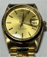 AN AUTHENTIC 18KT ROLEX WATCH WITH 14KT GOLD BAND