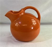 Vintage orange ball pitcher