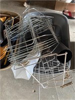 Two totes, one with wire baskets, and some