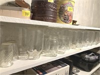 Two shelves of canning jars