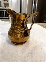 Antique copper lustre jug embossed with elk, made