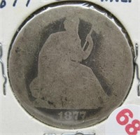 1877 Seated liberty silver half dollar.