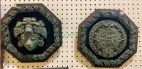 Two framed Mayan wall decorations, crushed