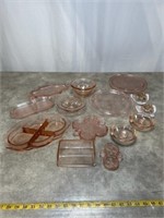 Pink colored glassware, mostly serving platters,