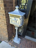 Cast iron mailbox. 2 broken corners that are