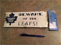 BEWARE OF THE LEAFS WOOD SIGN