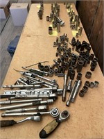 Tabletop of Sockets and Ratchet Wrenches.