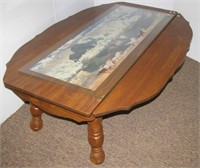 Double drop leaf coffee table featuring glass top