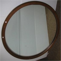 Round wall mirror. Measures 39" across.