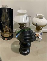 4 small oil lamps - all about 9 inches tall