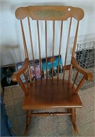 Rocking chair with gold accent stencil on wood