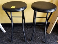 2 BLACK FOLDING STOOLS