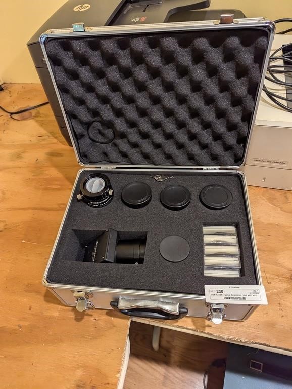 Metal Celestron case with lens