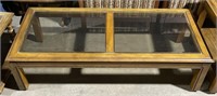 (G) Vintage Glass and Wood Coffee Table 55” x 25”