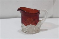 A Small Glass Pitcher