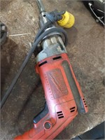 Milwaukee drill, plugged in and works