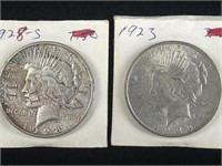 1928 and 1923 piece silver dollars