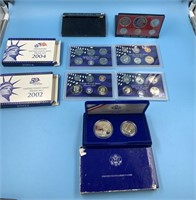 4 Coin sets: 2004 proof, 1977 proof, 2002 proof, 1
