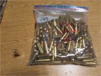 bag of 7mm empty brass shells