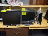 five Dell computer monitors