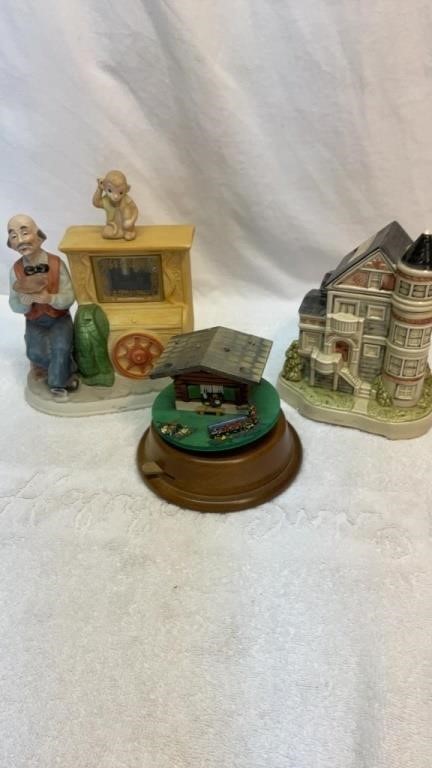 Three music boxes, one is a bank