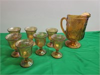 (7) Marigold Carnival Juice Glasses and a Pitcher