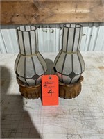 Two wood candle holders with globes