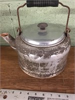 Old aluminum teapot